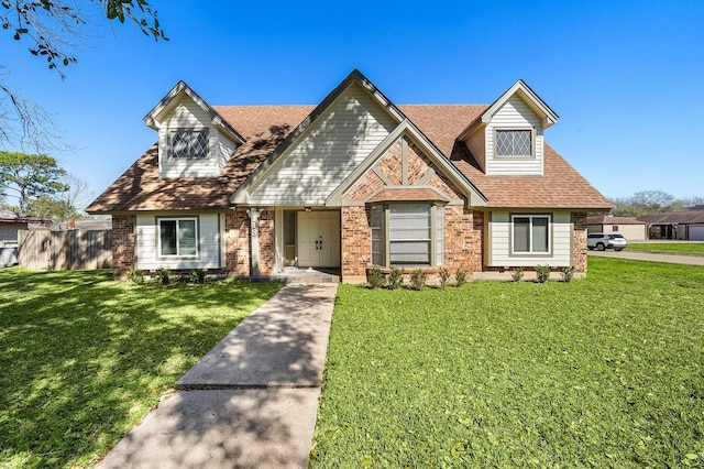 view of front of home with a front lawn