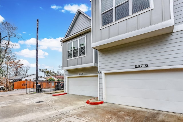 view of side of property with a garage