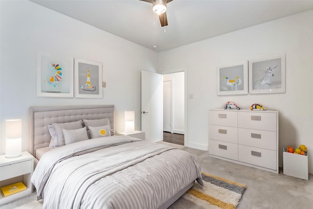 bedroom with ceiling fan and carpet flooring