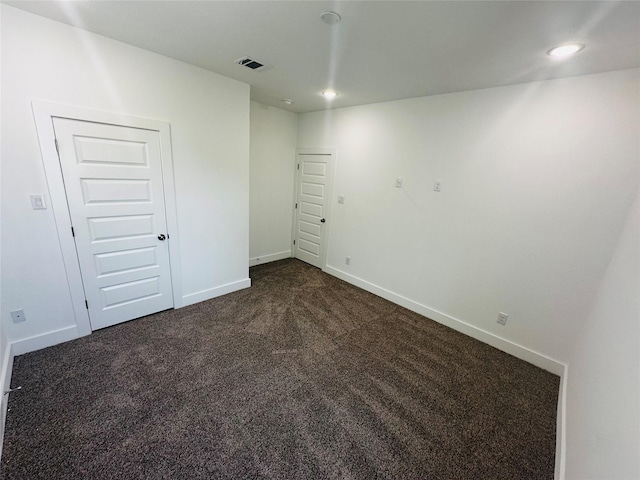 view of carpeted spare room