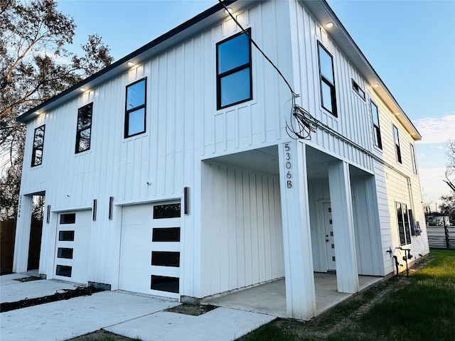 view of side of property with a garage