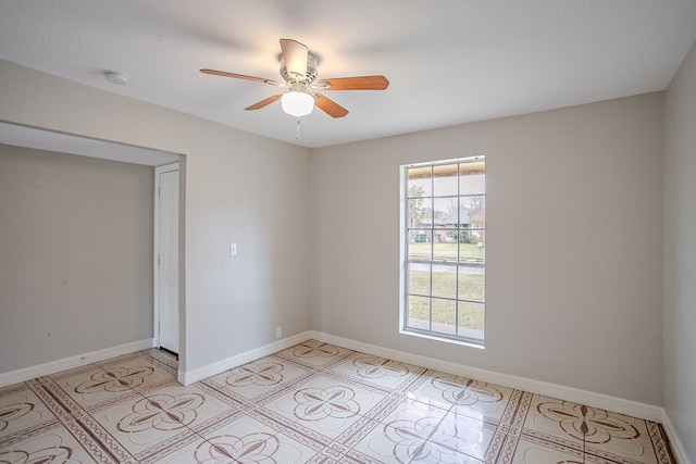 unfurnished room with ceiling fan