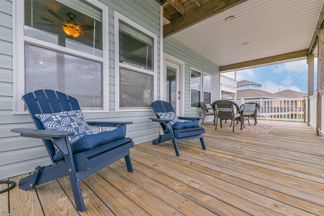 wooden terrace featuring covered porch