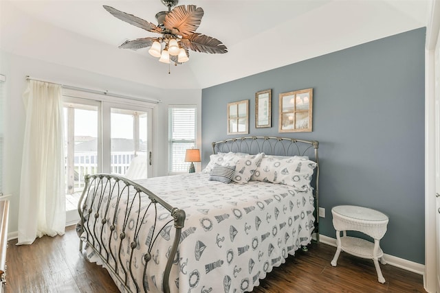 bedroom featuring ceiling fan, dark hardwood / wood-style flooring, lofted ceiling, and access to exterior