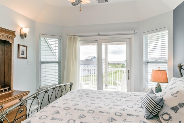 bedroom with ceiling fan and access to outside