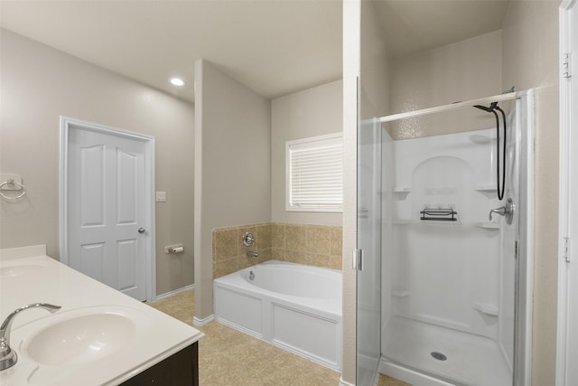 bathroom with independent shower and bath and vanity