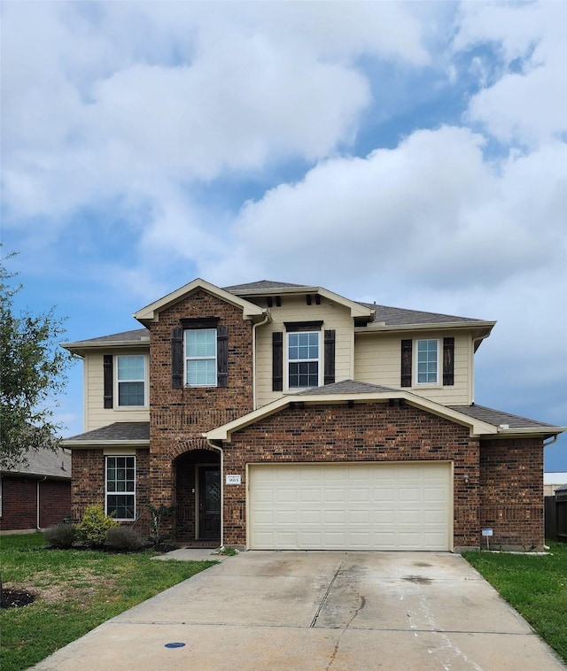 view of front of property with a garage