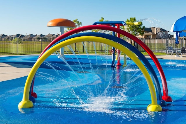 view of property's community featuring a playground