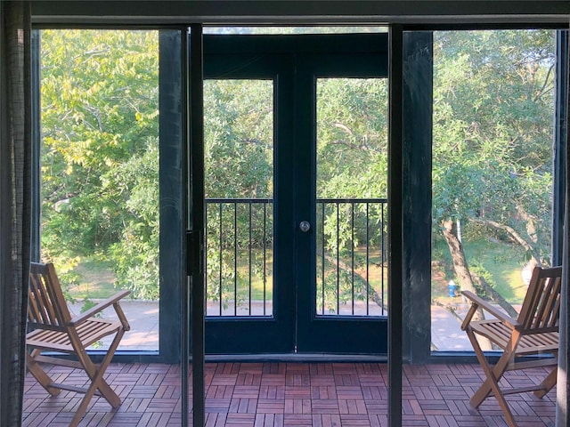 doorway featuring parquet flooring