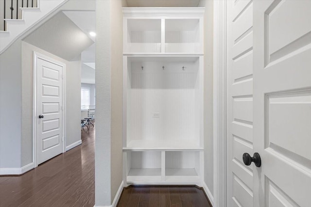 mudroom with dark hardwood / wood-style floors