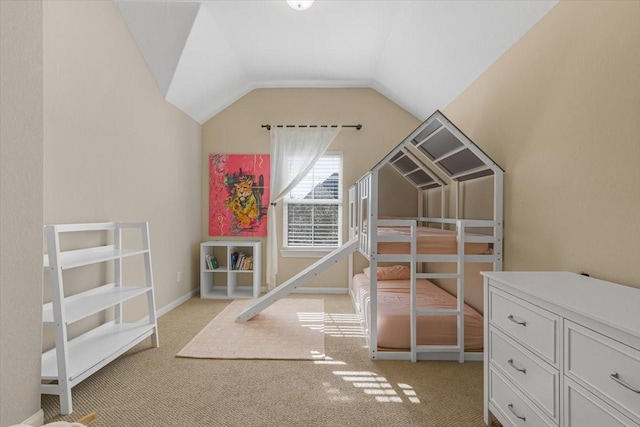 unfurnished bedroom with lofted ceiling and light colored carpet