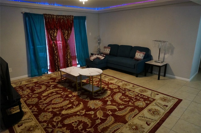 living room with tile patterned floors