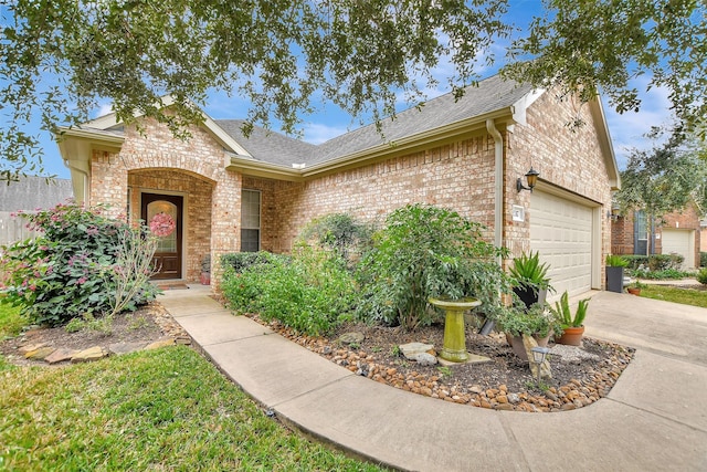 ranch-style home with a garage