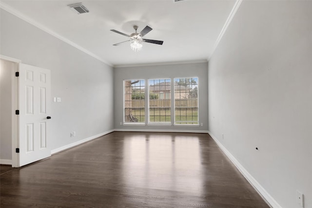 unfurnished room with ceiling fan, dark hardwood / wood-style flooring, and crown molding