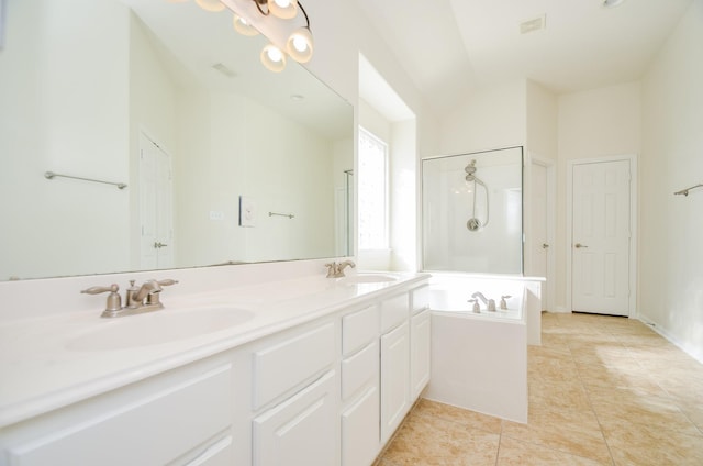 bathroom featuring lofted ceiling, tile patterned floors, separate shower and tub, and vanity