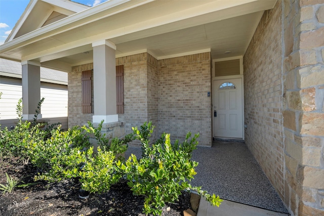 doorway to property featuring a porch