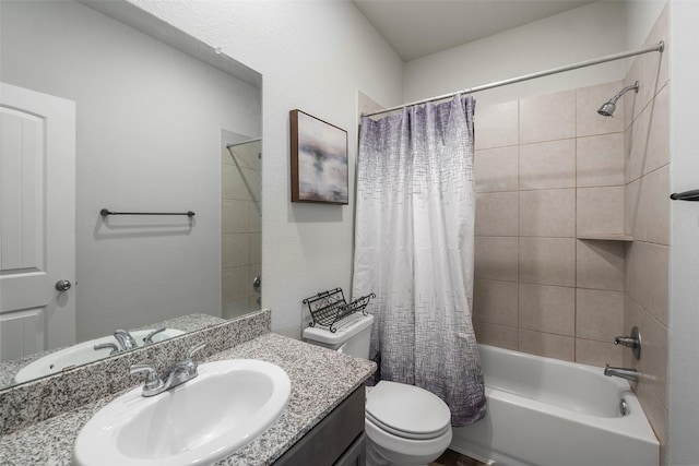 full bathroom with toilet, shower / tub combo, and vanity