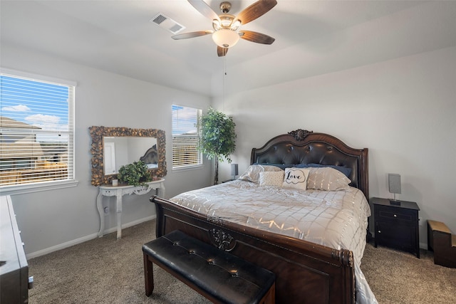 bedroom with ceiling fan and carpet