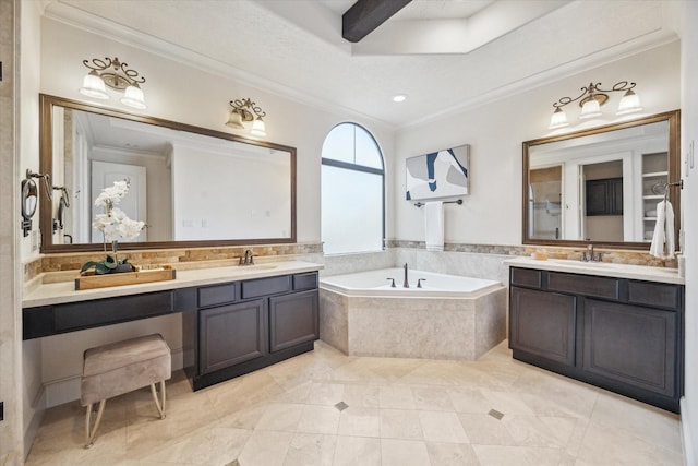 bathroom featuring vanity, tiled bath, and crown molding