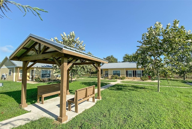 surrounding community featuring a lawn and a gazebo