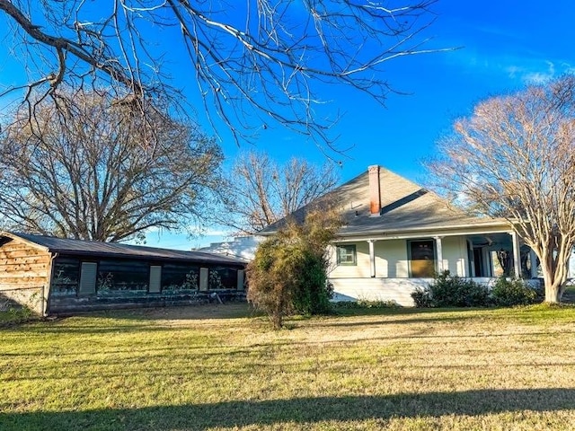 view of front of home with a front yard