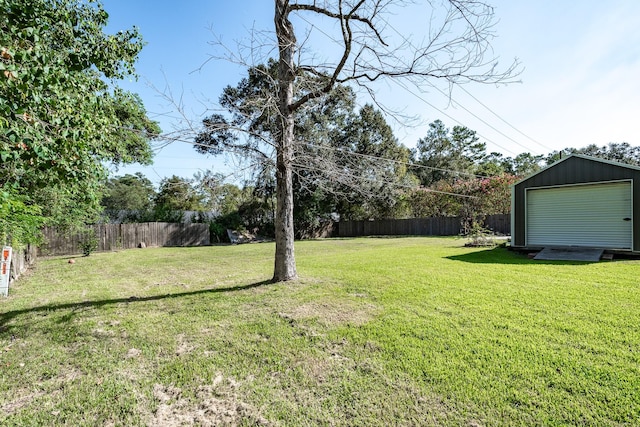 view of yard featuring a garage