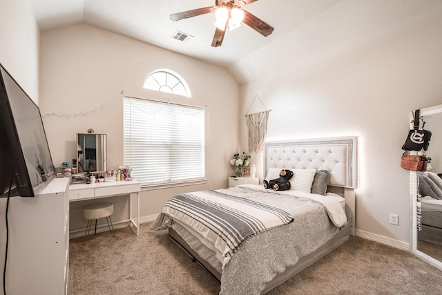 bedroom featuring lofted ceiling, ceiling fan, and light colored carpet