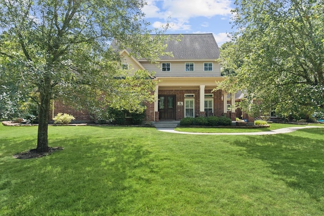 view of front of home with a front lawn