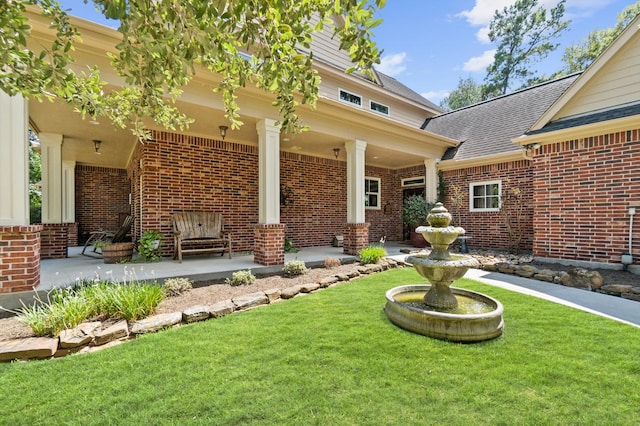 exterior space featuring a front yard