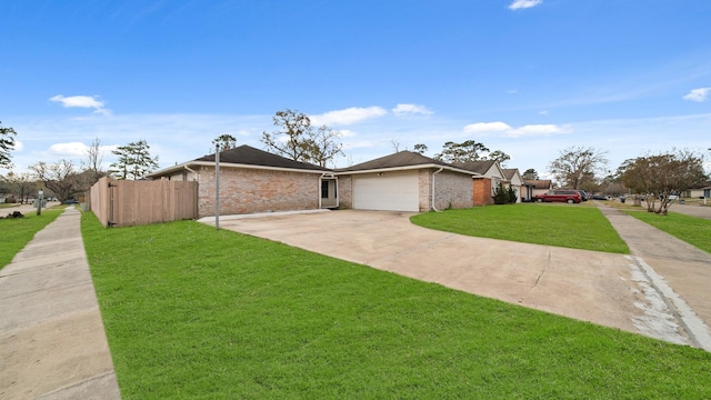 ranch-style house with a garage and a front yard