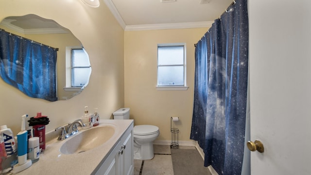 bathroom with plenty of natural light, tile patterned floors, vanity, and toilet