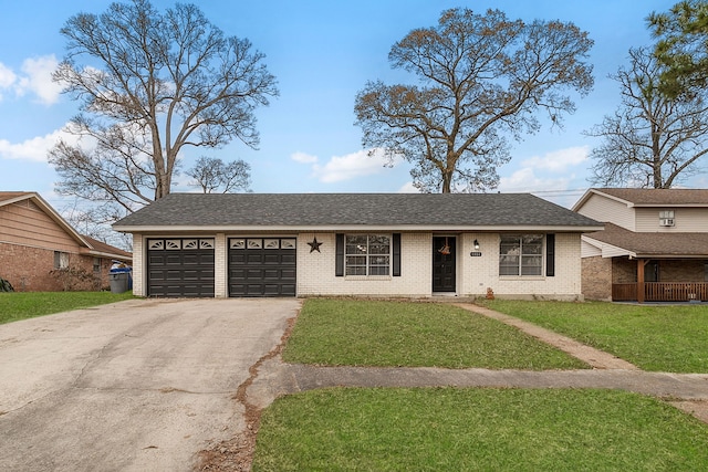 view of front facade with a front lawn and a garage