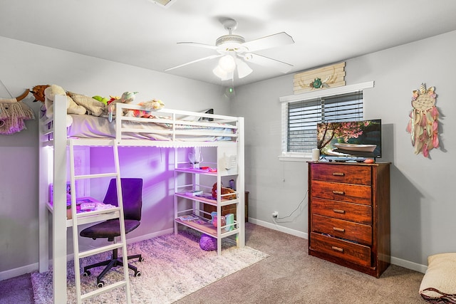 bedroom with light carpet and ceiling fan