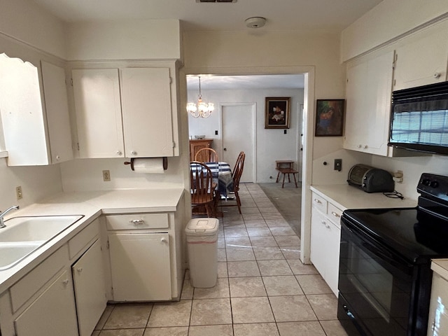 kitchen featuring decorative light fixtures, black appliances, an inviting chandelier, white cabinets, and sink