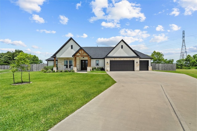 view of front facade with a front yard and a garage