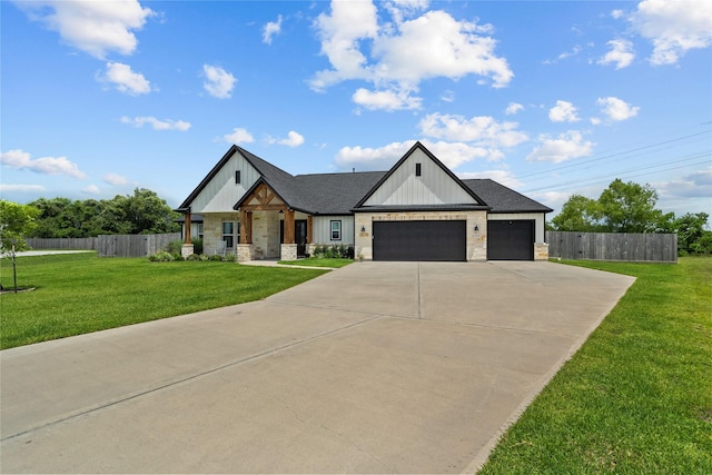 view of front of home featuring a front lawn and a garage