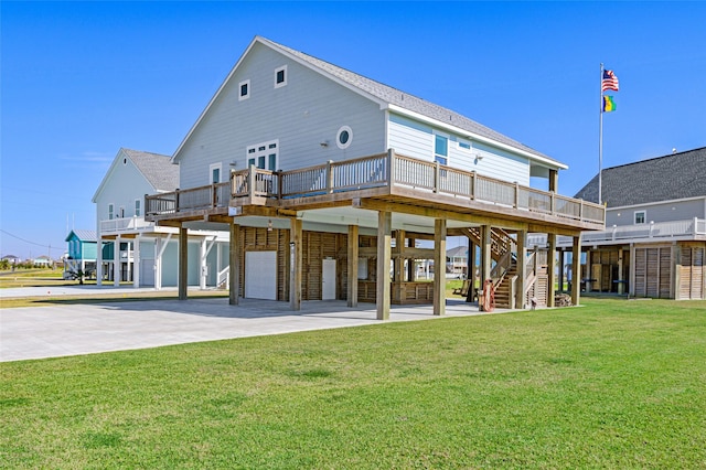 back of house with a yard and a wooden deck