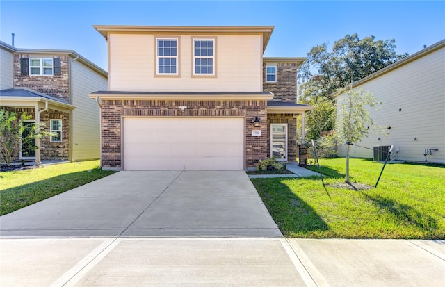 view of property featuring cooling unit, a front yard, and a garage