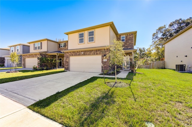 view of property with cooling unit, a front yard, and a garage