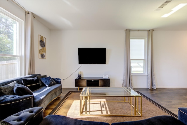 living room with dark hardwood / wood-style floors