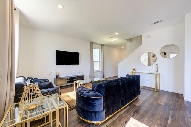 living room featuring dark hardwood / wood-style floors