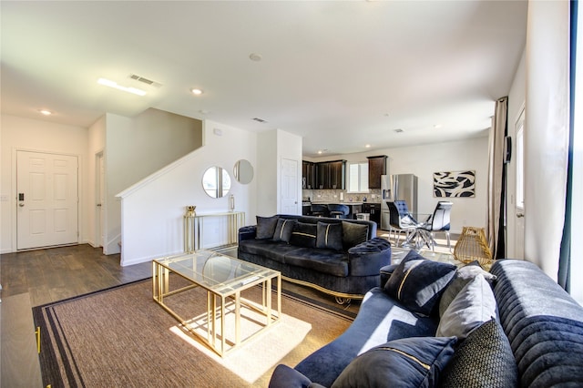 living room featuring dark hardwood / wood-style floors