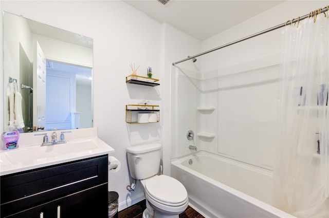 full bathroom with hardwood / wood-style flooring, shower / tub combo with curtain, vanity, and toilet