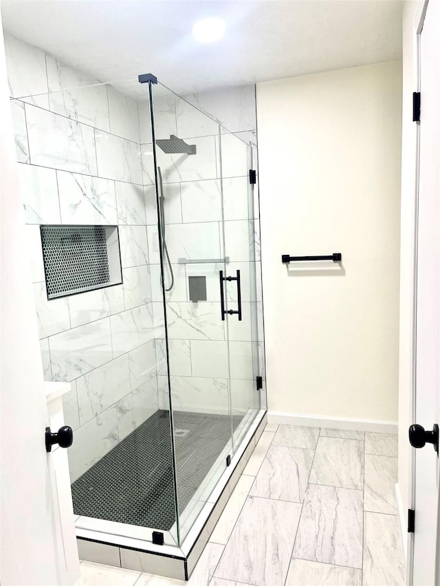 bathroom with an enclosed shower