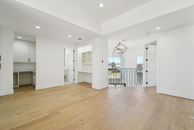 empty room with light wood-type flooring