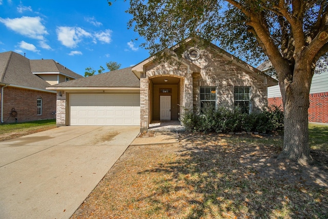 view of front of property featuring a garage