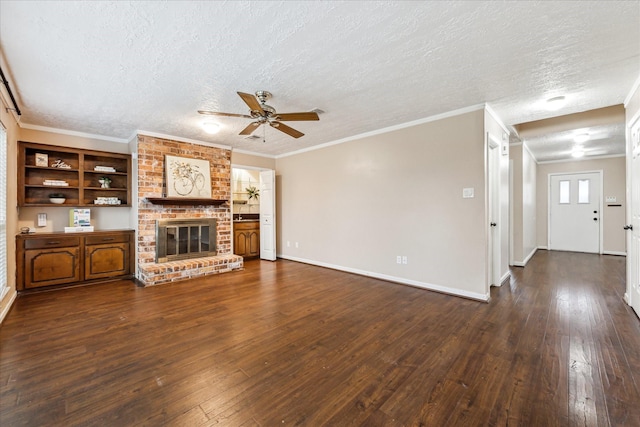 unfurnished living room with a textured ceiling, ceiling fan, dark hardwood / wood-style flooring, and a fireplace