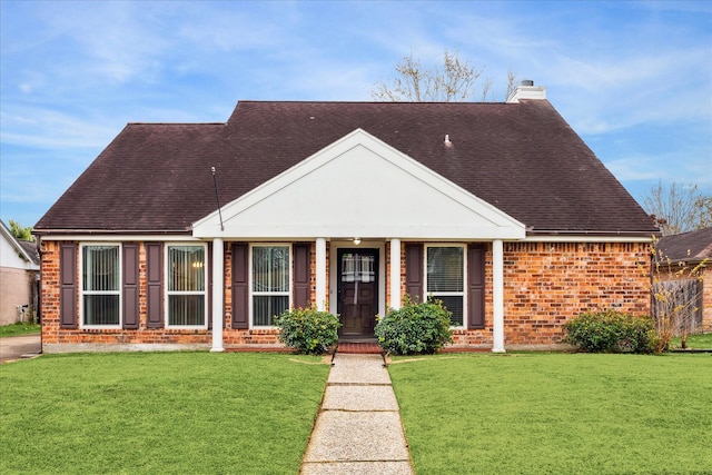 view of front of house with a front lawn