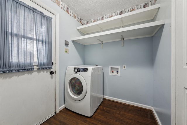 washroom featuring a textured ceiling, washer / clothes dryer, and dark hardwood / wood-style floors