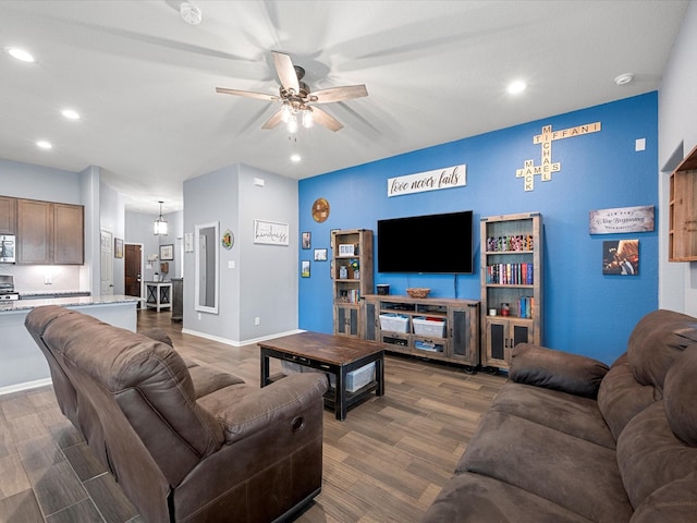 living room featuring dark wood-style floors, recessed lighting, baseboards, and a ceiling fan